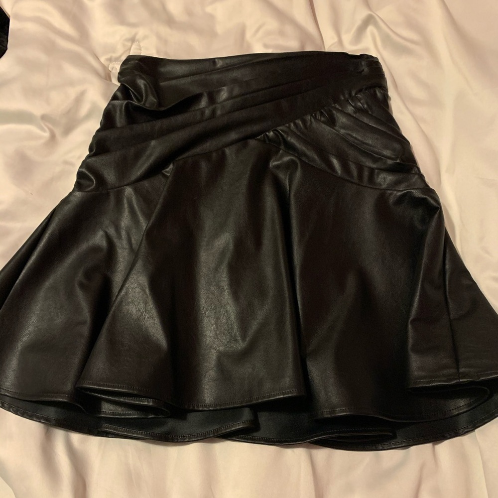 Bebe pleather circle skirt.